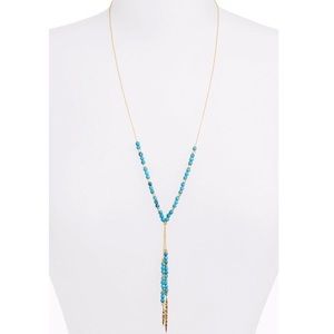 Gorjana gold necklace with turquoise stones.